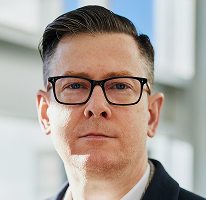 CEO Alexander Hughes, lãnh đạo cấp cao tại công ty giao dịch tiền điện tử, chân dung.